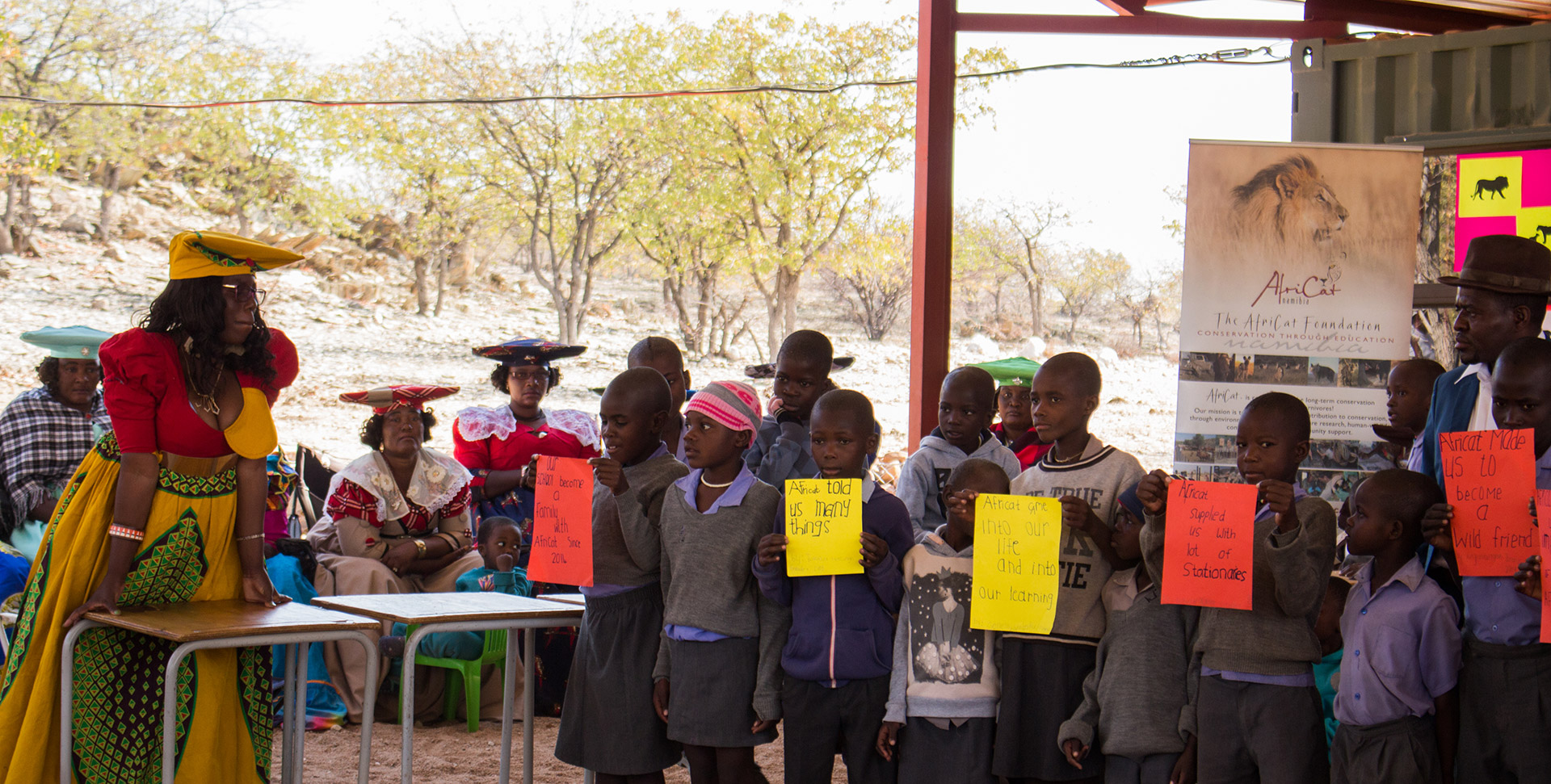 Onguta school children showing what they have learnt about lions